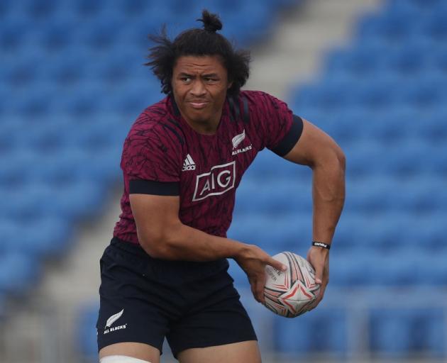 Caleb Clarke looks to pass the ball at All Blacks training this week. Photo: Getty Images