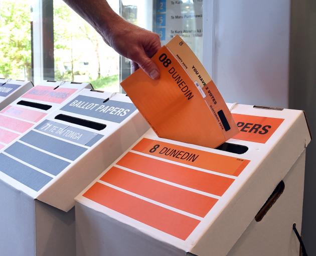 An advance voter casts their early vote at the Otago Polytechnic Hub, in Dunedin, yesterday....