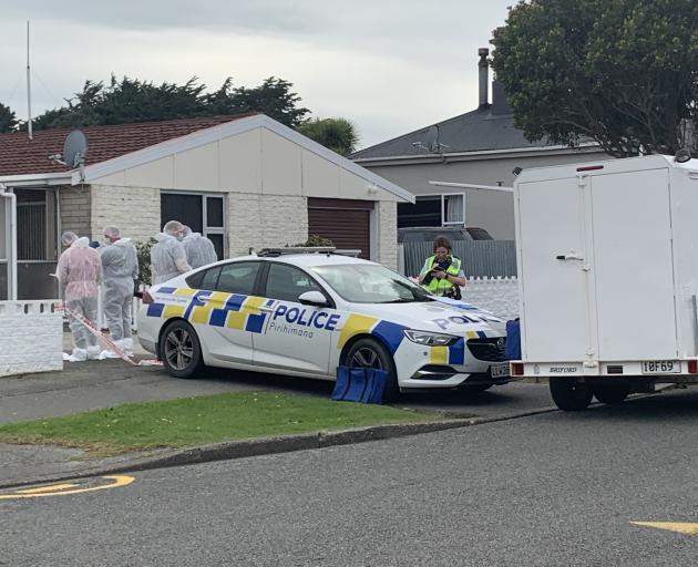 A scene examination is taking place on Grace St where a woman was found dead. Photo: Abbey Palmer