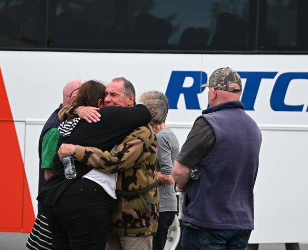 Residents return from a tour of the fire devastated Lake Ohau village. Photo: Craig Baxter