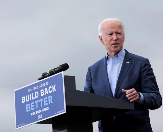 Democratic presidential candidate Joe Biden speaks during a drive-in campaign event in Toledo,...