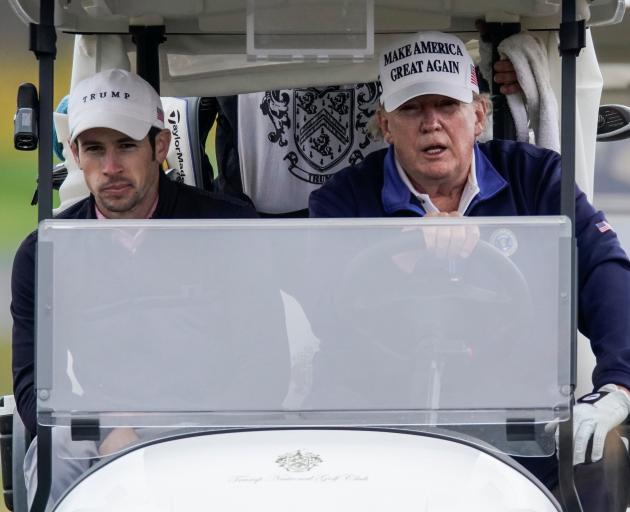 President Donald Trump took to his golf course in Sterling, Virginia at the weekend. Photo: Reuters