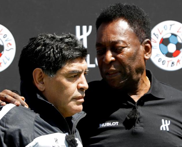 Maradona with another legend of the game, Pele, in 2016. Photo: Reuters 
