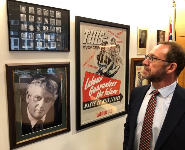 Minister Responsible for Pike River Re-entry Andrew Little with a picture of the Pike 29. PHOTO:...