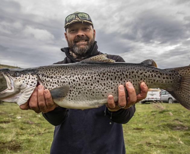 Cust's Danny Pye with the heaviest fish landed during the opening of the high country fishing...
