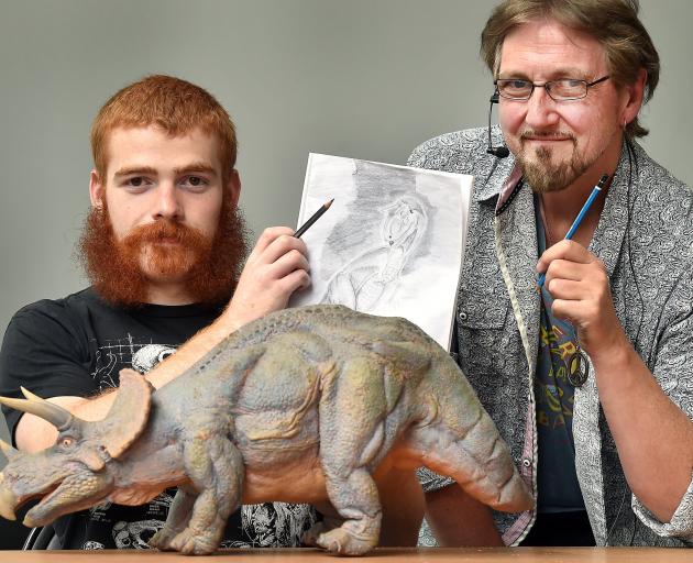 University of Otago geology and paleontology student Shane Meekin (left) gets advice on how to...