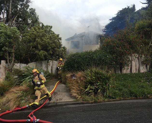 Crews were called to the fire in Beaconsfield St about 4.30pm yesterday. Photo: Gerard O'Brien 