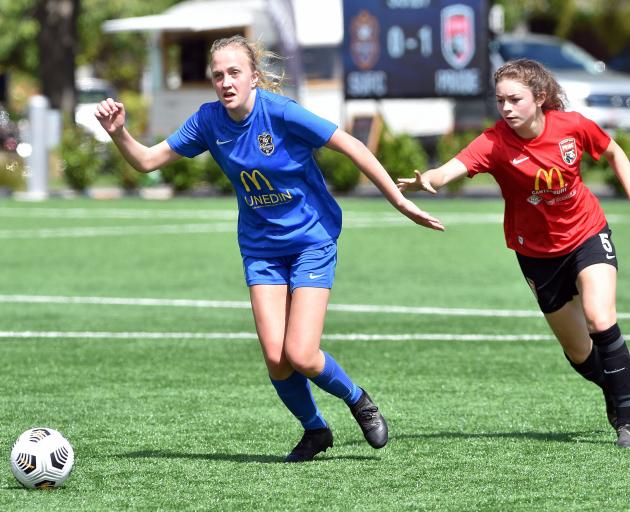Southern United forward Emily Morrison and Canterbury Pride’s Makaela Hunt chase the ball during...