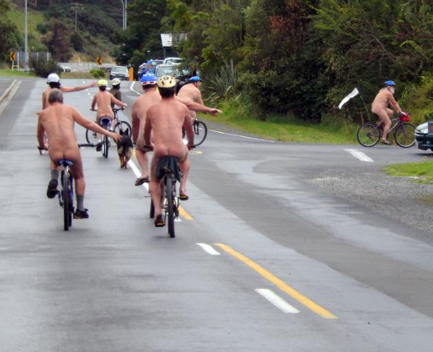 Southern Free Beaches members cycle in a pack as part of the World Naked Bike Ride in Waitati in...