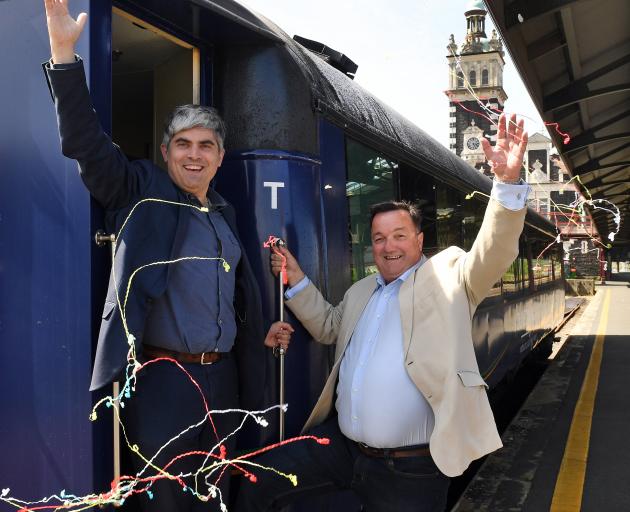 Dunedin Mayor Aaron Hawkins (left) and Dunedin City Holdings Ltd chairman Keith Cooper celebrate...