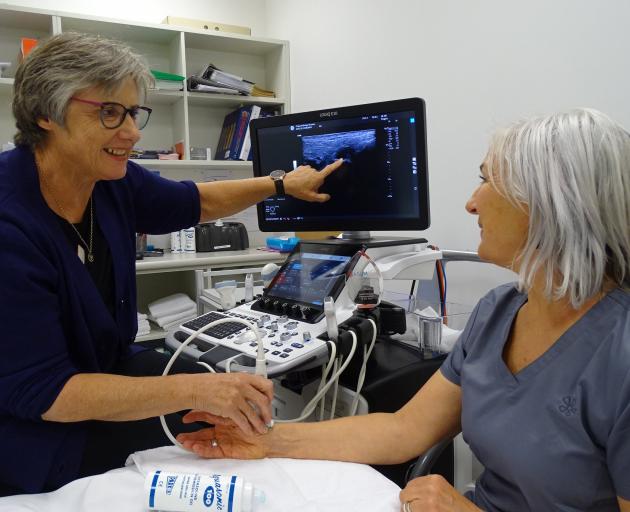 Wanaka sonographer Jill Muirhead demonstrates the latest ultrasound technology to radiographer...