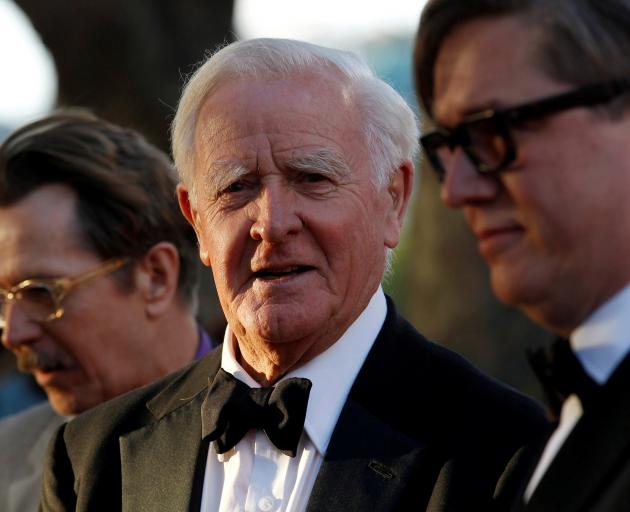 British author John Le Carre poses for photographers with British actor Gary Oldman and Swedish director Tomas Alfredson. Photo: Reuters British author John Le Carre poses for photographers with British actor Gary Oldman and Swedish director Tomas Alfredson. Photo: Reuters