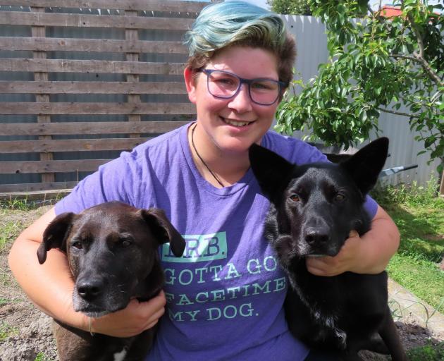 Dog trainer Mady Bensdorp with canine buddies Dusty (left) and Cas. Photo: Supplied