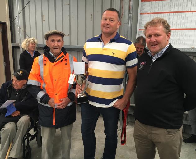 Marlborough farmers Ali (left) and Stu Campbell (centre) are congratulated by the sponsor South...