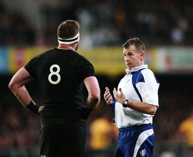 Nigel Owens speaks with Kieran Read during the 2017 Rugby Championship. Photo: Getty Images