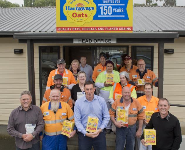 Harraways staff in front of the company’s head office in Green Island this week. Chief executive...