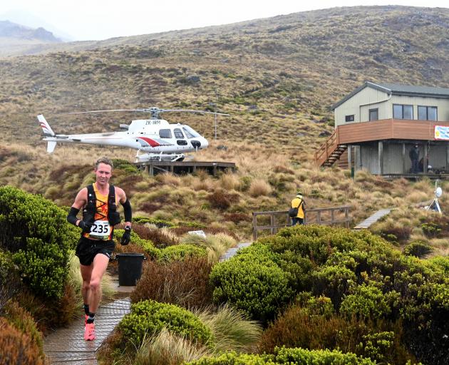 Kepler Challenge winner Daniel Jones, of Wellington, heads back down from the Luxmore Hut.