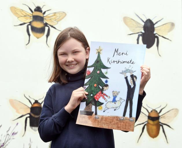 Mila Schouten Richardson with her drawing of Prime Minister Jacinda Ardern’s family, which will...