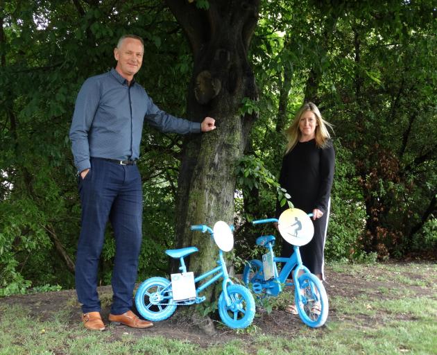 Children will scavenge for the blue bikes held by Waitaki Mayor Gary Kircher and Waitaki District...