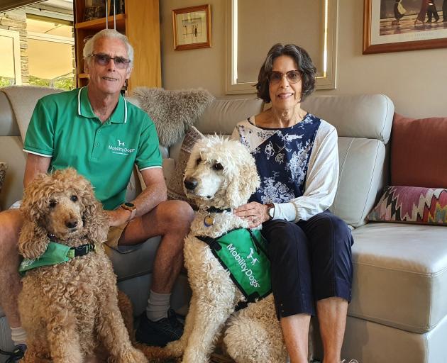 Mobility Assistance Dog Trust co-ordinator Grant Reid with wife Judy, retired assistance dog...