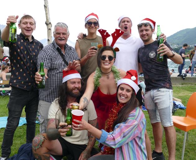Celebrating Christmas in Queenstown yesterday are ( from left, back) Stephen Sweeney, of Ireland;...