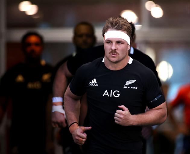 Sam Cane of the All Blacks leads his team onto the field during the 2020 Tri-Nations match...