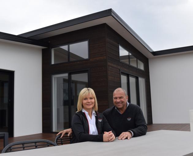 Fowler Homes Otago owners Nicky and Mel Fowler relax at a house their company built in Mosgiel - ...