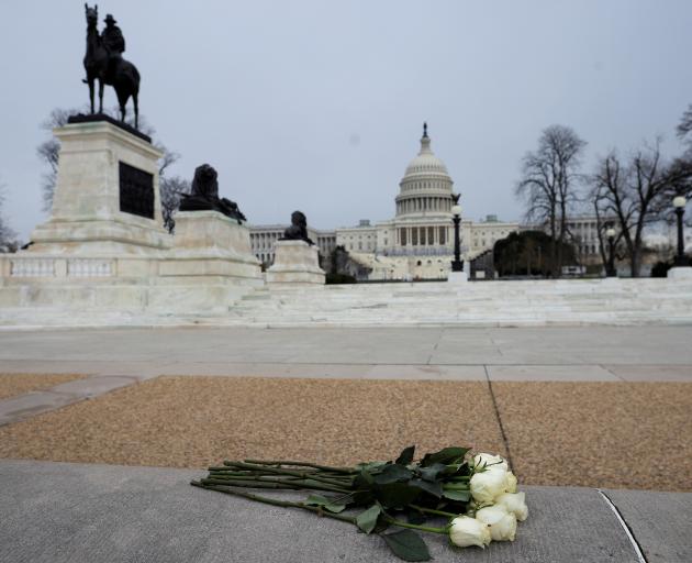 Flowers are placed near the U.S. Capitol in tribute to Capitol Police Officer Brian Sicknick. Photo: Reuters