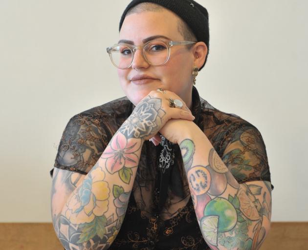 Prudence Jopson’s arms reveal some of her favourite tattoos, products of the sun. PHOTO: GREGOR...
