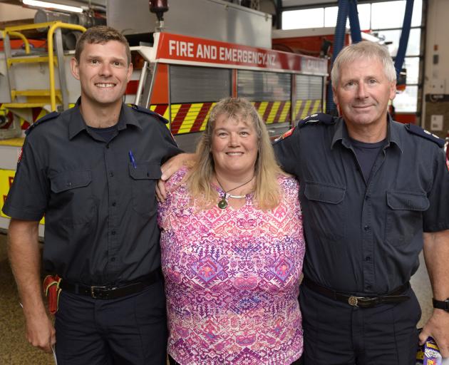 Phillipa Scott, of Dunedin, meets firefighters Aaron Collins (left) and Rob Torrance at Dunedin’s...