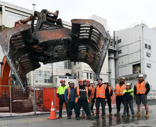 New Dunedin Hospital build staff involved in a new course in demolition, alongside a 20-tonne...