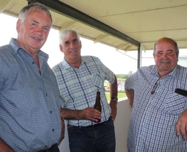 Taking it easy at the trots are (from left) Bevan Brown, of Lorneville, Paul McEntyre, of...