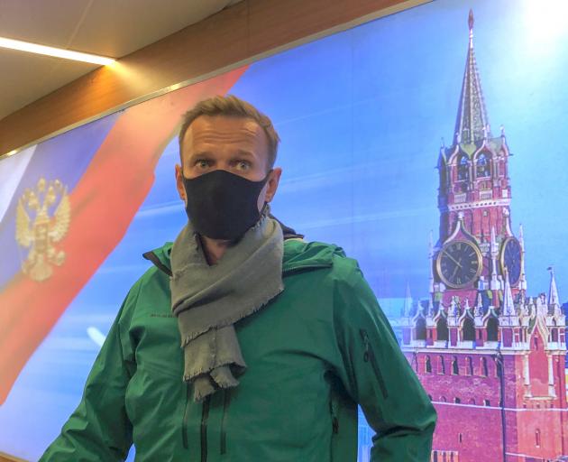 ussian opposition leader Alexei Navalny speaks with journalists upon the arrival at Sheremetyevo...