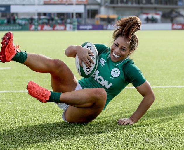 Sene Naoupo, who has since returned to New Zealand, scores a try in a rugby match against...