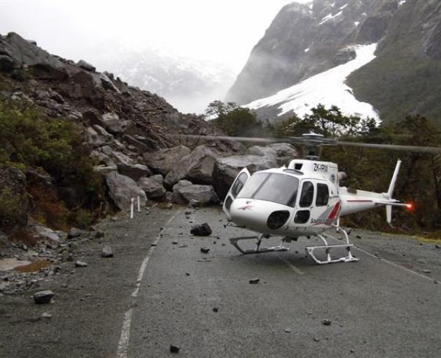 Rocks and debris on the Milford Rd after a slip
overnight. PHOTO: SUPPLIED