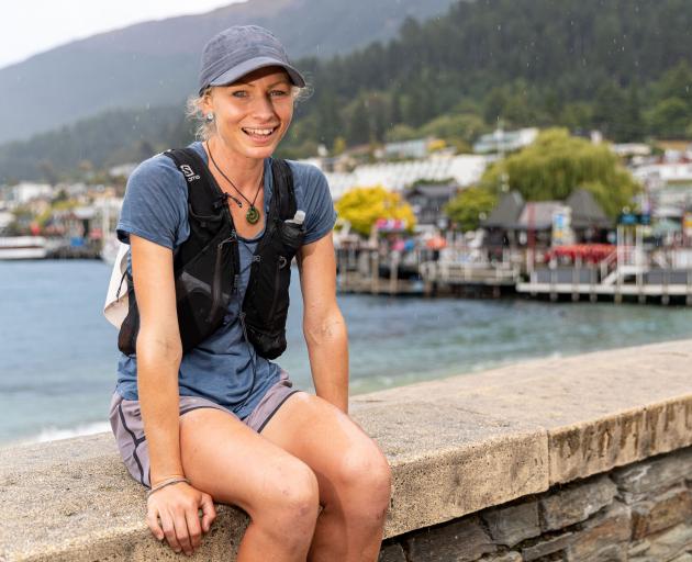 Brooke Thomas, of Queenstown, takes a breather in the resort yesterday morning on her run from...