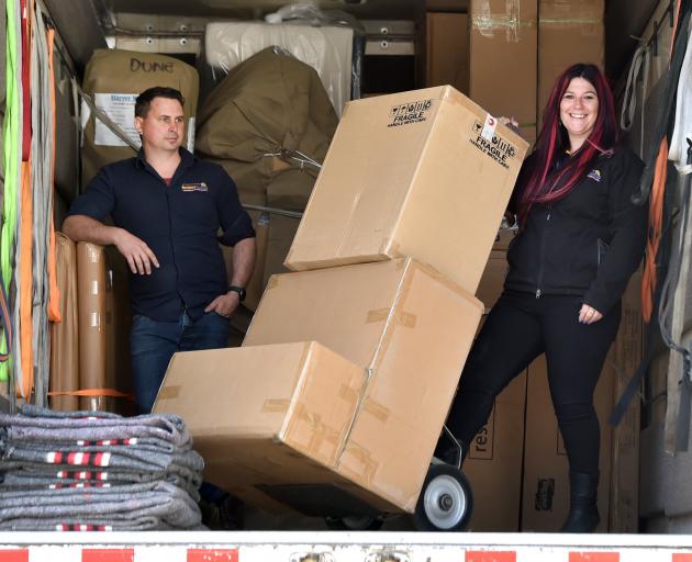Southern Furniture Movers owner and managing director Teressa Grigg and general manager Simon...