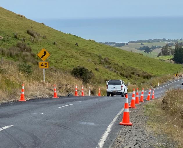 A vehicle negotiates the short stretch of Scroggs Hill Rd, between Allanton-Scroggs Hill Rd and...