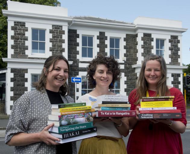 University Book Shop staff members (from left) Rosie Hill, Charlotte McKay and Rebekah Clements...