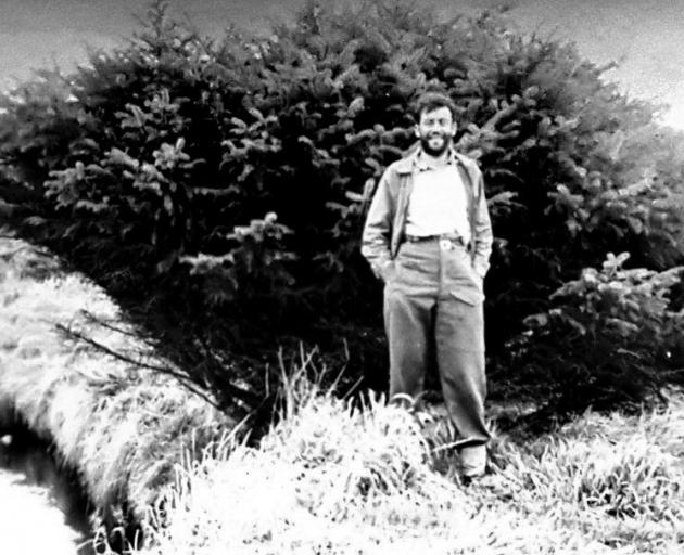 Robert Stanley stands in front of the spruce in the early 1950s. PHOTO: SUPPLIED Robert Stanley stands in front of the spruce in the early 1950s. PHOTO: SUPPLIED