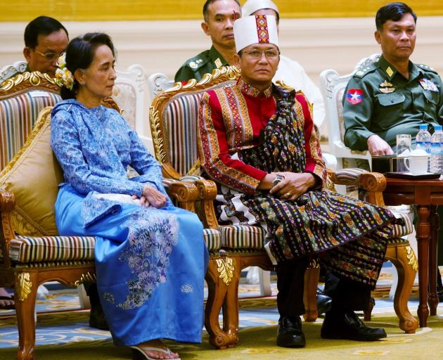Aung San Suu Kyi (L) and vice presidents Henry Van Thio (centre) and Myint Swe. Photo: Reuters Aung San Suu Kyi (L) and vice presidents Henry Van Thio (centre) and Myint Swe. Photo: Reuters