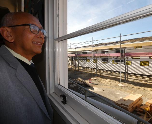 Maniototo Area School principal Joe Ferdinands watches from one of the school buildings as the...