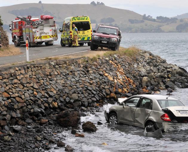 The car after it ended up in the sea near Deborah Bay, Dunedin, yesterday. PHOTO: LINDA ROBERTSON