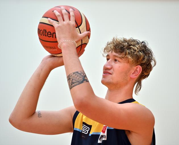 Otago Nuggets signing Akiva McBirney-Griffin gets in some practice at the Edgar Centre yesterday....