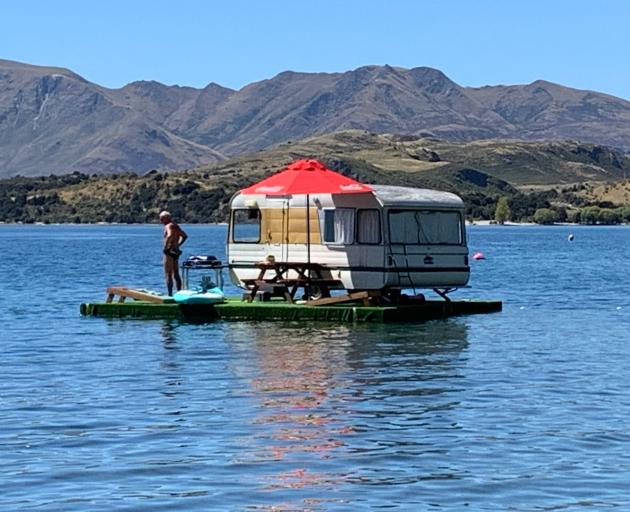 Glendhu Bay Motor Camp manager Phil Hunt ‘‘camps’’ in the middle of Lake Wanaka yesterday. PHOTO:...