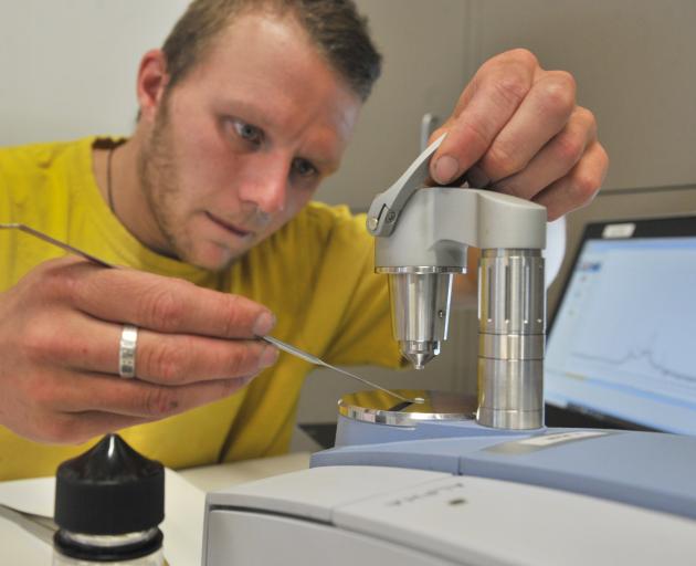 Know Your Stuff NZ Dunedin team leader Ashley Heydon legally tests a drug sample at the...