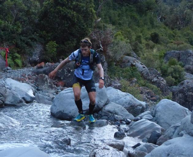 Eventual Coast to Coast winner Sam Clark (Whakatane) negotiates his way through Doreen Creek....