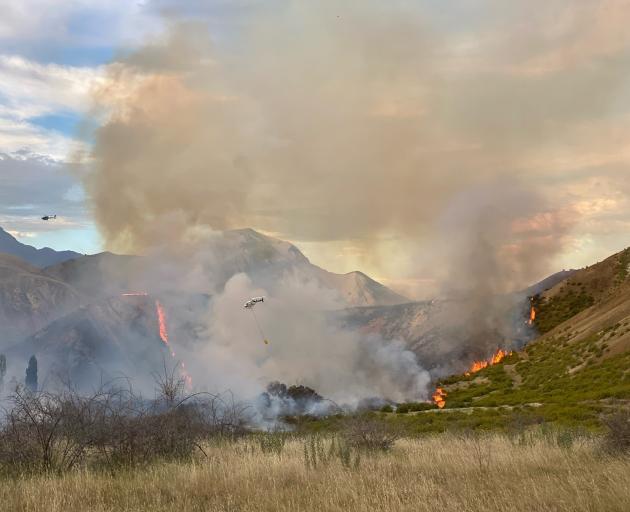 Helicopters working at the scene of the Clarence Valley fire. Photo: Fire and Emergency NZ