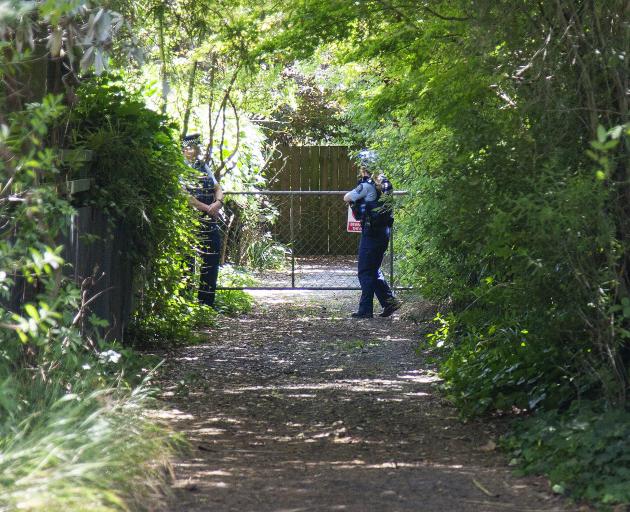 Police guard the property on Main North Rd in Papanui. Photo: Geoff Sloan