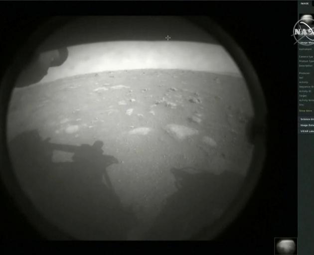 The first images arrived moments after Nasa's Perseverance Mars roverspacecraft successfully...